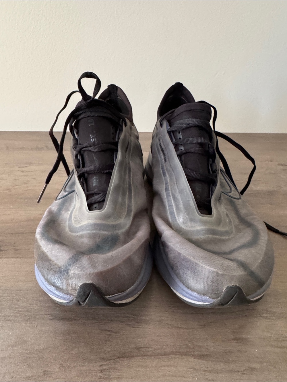 Nike women’s Grey and Black Wave-Pattern Sneakers